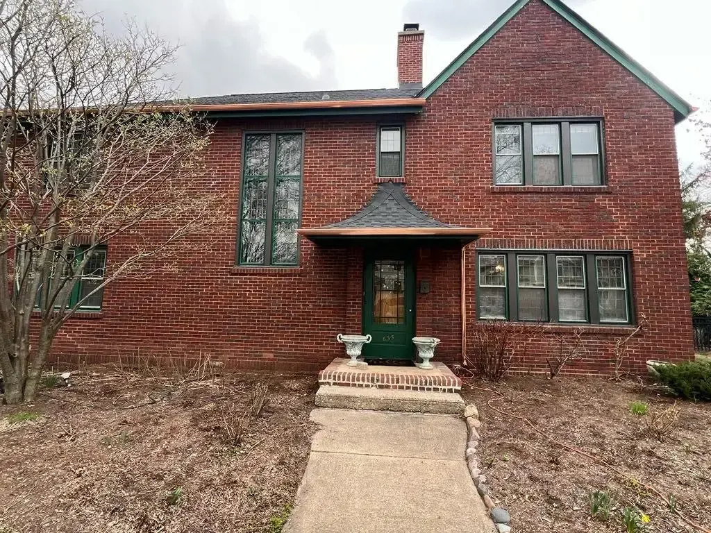 Custom half round copper gutters and twisted downspouts — Chicago, IL — photo 4
