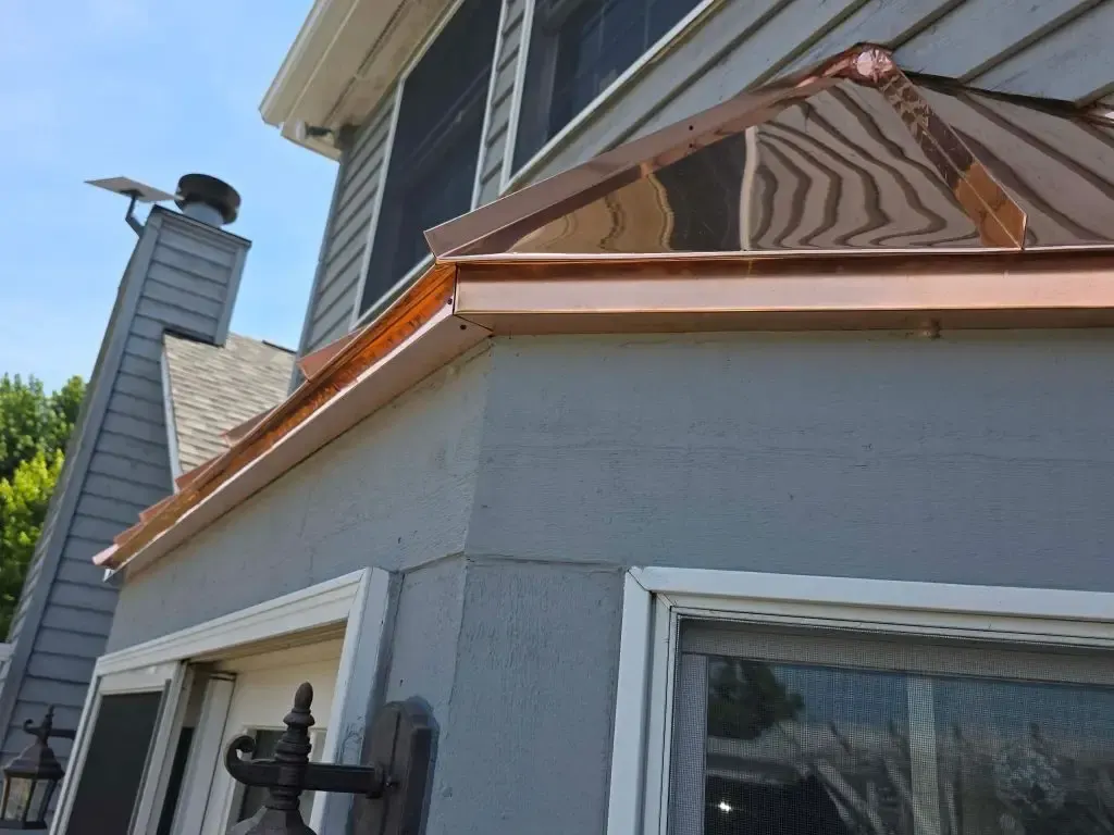 Roofing, copper chimney cap and copper awning — Custer Park, IL — photo 1