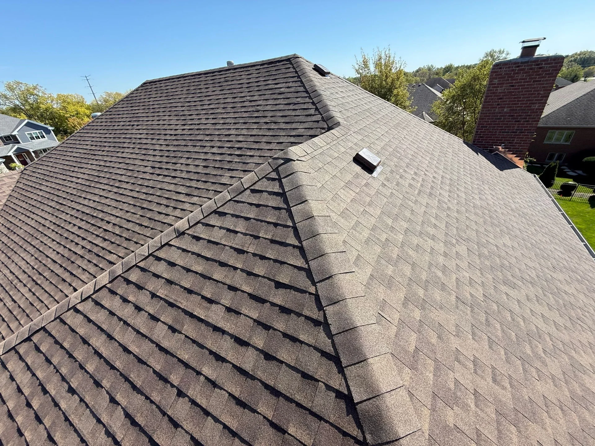 GAF architectural shingles and ridge caps on a completed Frankfort roof